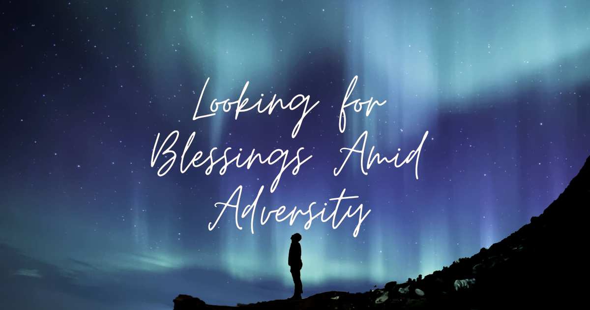 Sky with man looking up with words Looking for Blessings Amid Adversity