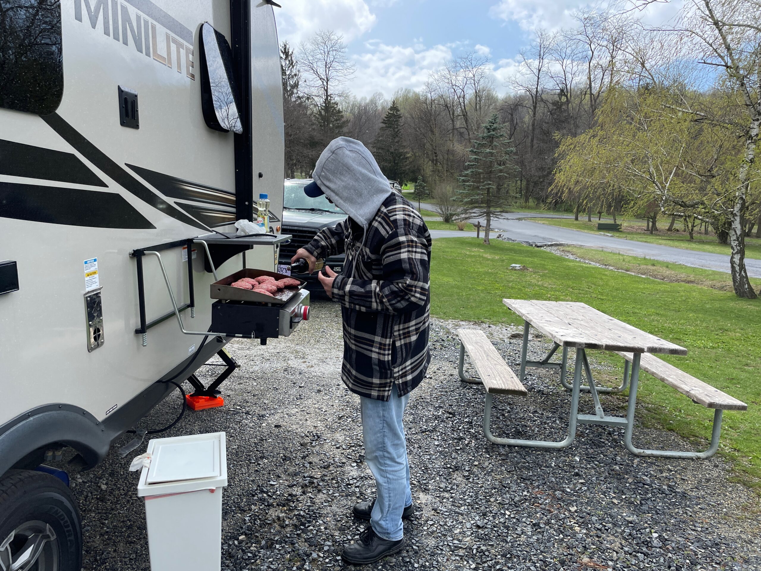 Shawn cooking burgers during a Nor'Easter at Hershey Thousand Trails